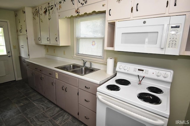 209 E Plum St, Linden, IN 47955 - kitchen with white appliances and light countertops