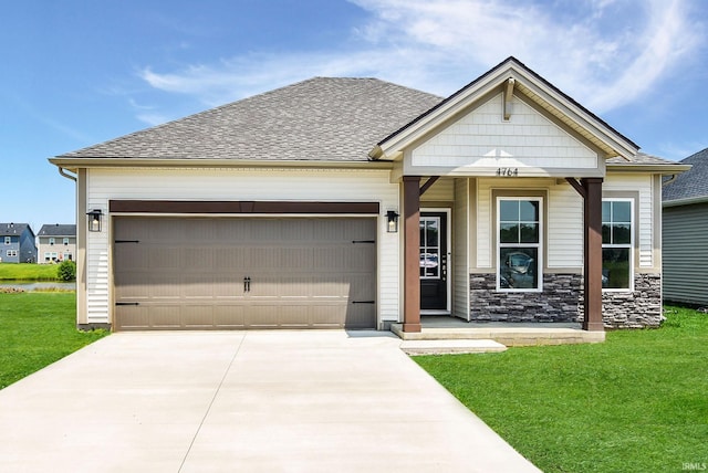 4764 Chelmsford Dr, Newburgh, IN 47630 - craftsman inspired home with concrete driveway, a garage, a front yard, and a shingled roof