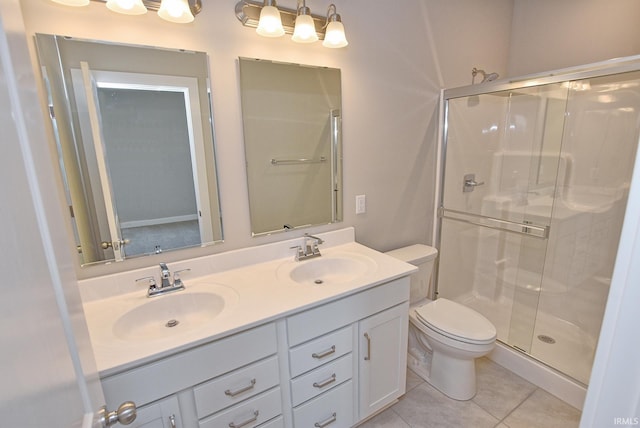 4764 Chelmsford Dr, Newburgh, IN 47630 - full bath featuring a stall shower, double vanity, and tile patterned flooring
