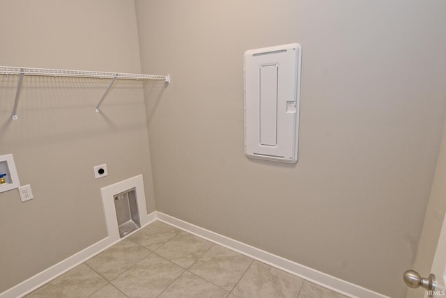 4764 Chelmsford Dr, Newburgh, IN 47630 - washroom featuring washer hookup, electric dryer hookup, and light tile patterned flooring