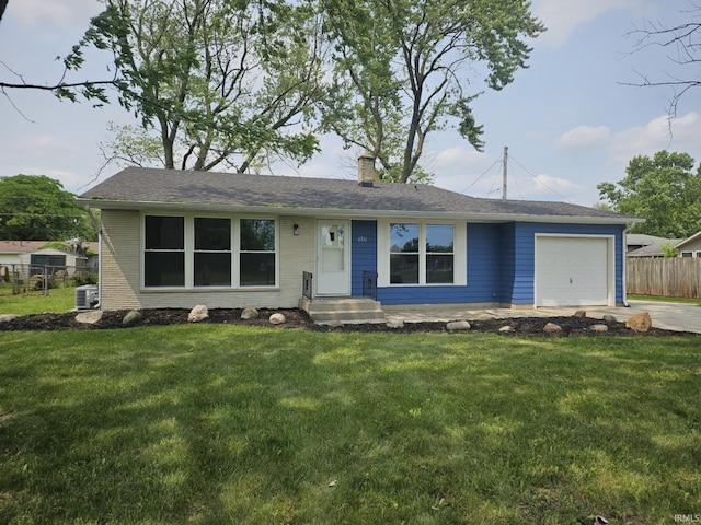 6711 Trier Rd, Fort Wayne, IN 46815 - ranch-style house featuring a garage, a chimney, and concrete driveway