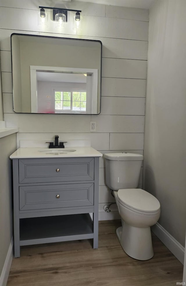 6711 Trier Rd, Fort Wayne, IN 46815 - bathroom with vanity and wood finished floors
