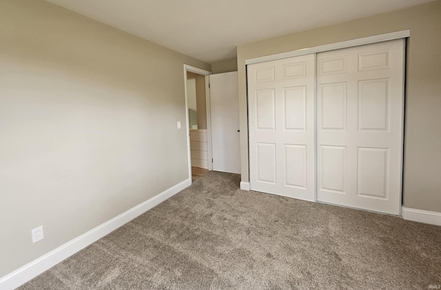 6711 Trier Rd, Fort Wayne, IN 46815 - unfurnished bedroom with carpet floors and a closet