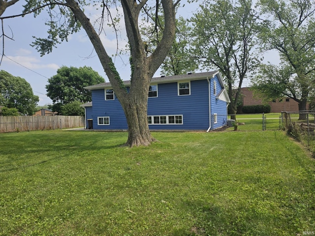 6711 Trier Rd, Fort Wayne, IN 46815 - back of property featuring a fenced backyard