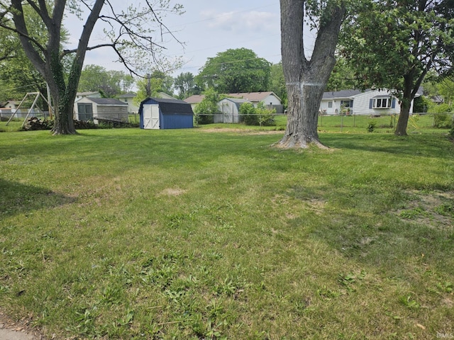 6711 Trier Rd, Fort Wayne, IN 46815 - view of yard with a storage unit