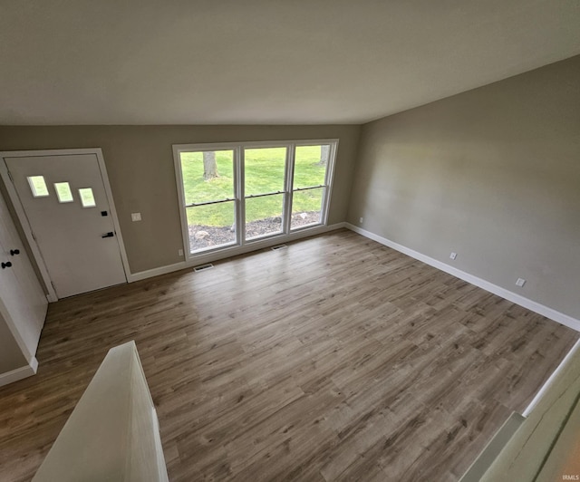 6711 Trier Rd, Fort Wayne, IN 46815 - entryway featuring baseboards and wood finished floors