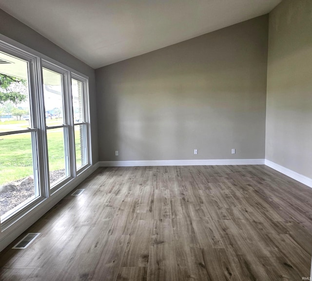 6711 Trier Rd, Fort Wayne, IN 46815 - empty room featuring lofted ceiling and wood finished floors
