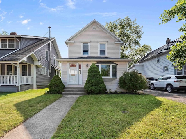 314 N Chauncey St, Columbia City, IN 46725 - view of front of home with a front lawn