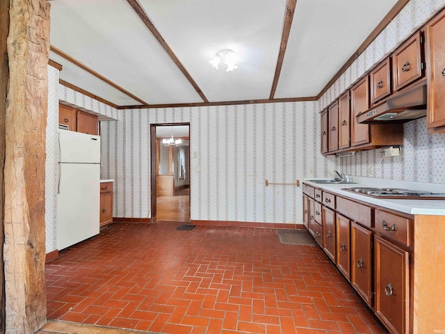 314 N Chauncey St, Columbia City, IN 46725 - kitchen featuring white appliances, wallpapered walls, under cabinet range hood, brick patterned floors, and ornamental molding