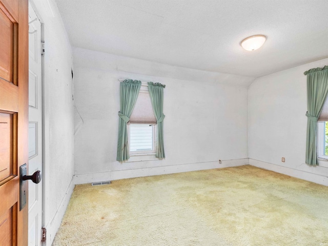 314 N Chauncey St, Columbia City, IN 46725 - carpeted spare room featuring lofted ceiling