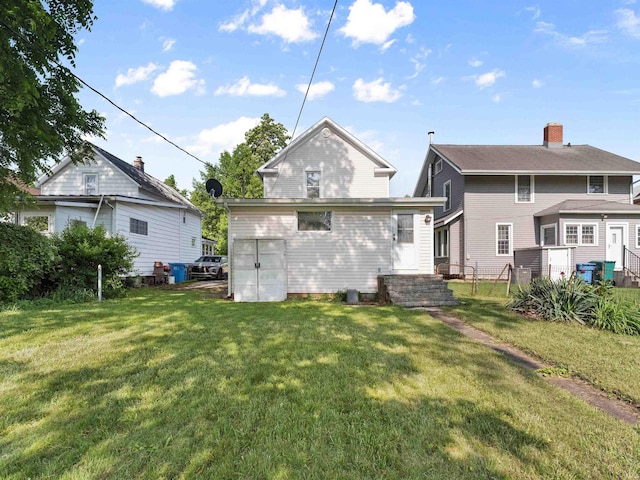 314 N Chauncey St, Columbia City, IN 46725 - back of property featuring a lawn