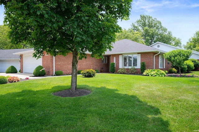 4501 N Wheeling Ave Unit 12-5, Muncie, IN 47304 - ranch-style home with an attached garage, a front lawn, brick siding, and concrete driveway