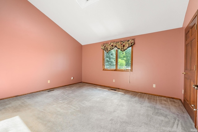 10028 Winding Shores Dr, New Haven, IN 46774 - empty room with light carpet and vaulted ceiling