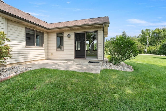 10028 Winding Shores Dr, New Haven, IN 46774 - property entrance featuring a patio area, a yard, and roof with shingles