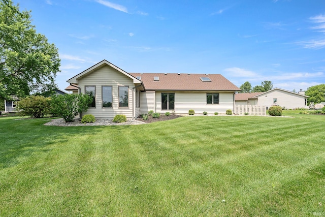 10028 Winding Shores Dr, New Haven, IN 46774 - rear view of house featuring a shingled roof