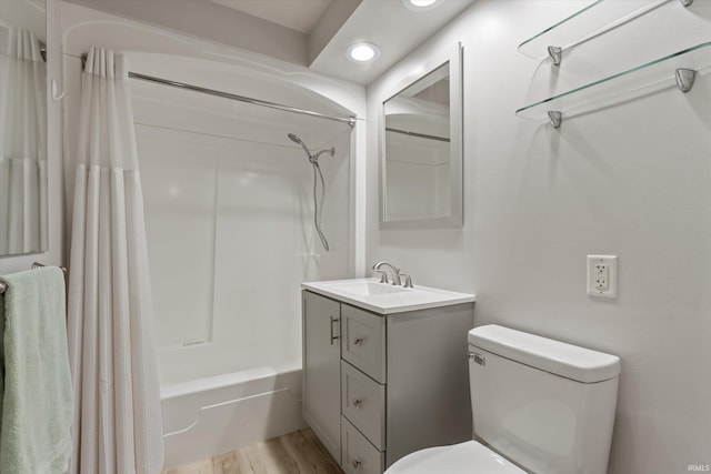 115 N Varsity Dr, South Bend, IN 46615 - bathroom featuring vanity, shower / bath combo, recessed lighting, and wood finished floors