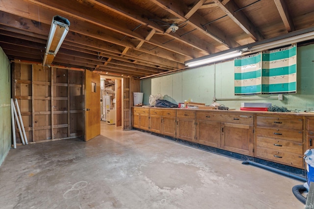 115 N Varsity Dr, South Bend, IN 46615 - misc room with concrete flooring and gas water heater