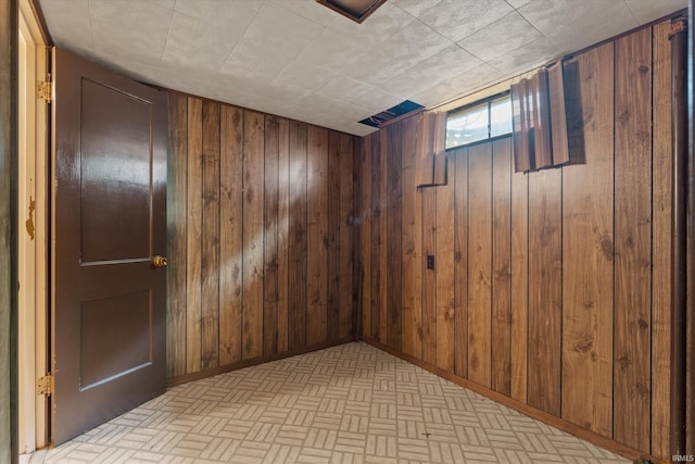 115 N Varsity Dr, South Bend, IN 46615 - basement featuring wood walls and baseboards