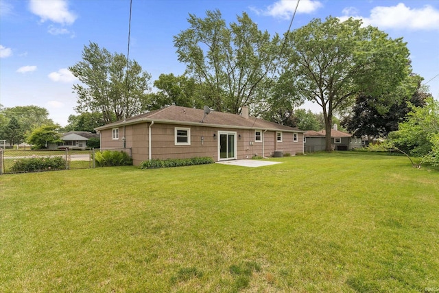 115 N Varsity Dr, South Bend, IN 46615 - rear view of property with a chimney and a patio