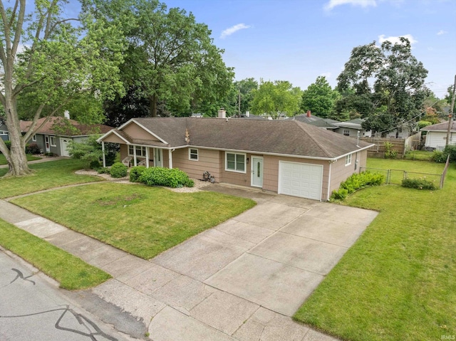 115 N Varsity Dr, South Bend, IN 46615 - ranch-style home featuring an attached garage, a shingled roof, and driveway