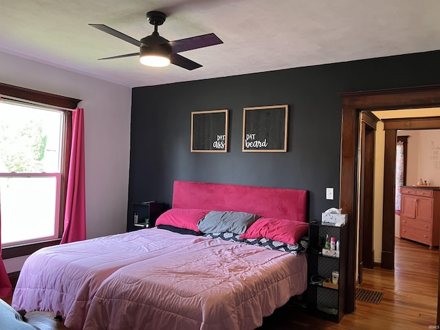 20 N Meridian St, Redkey, IN 47373 - bedroom featuring wood finished floors and ceiling fan