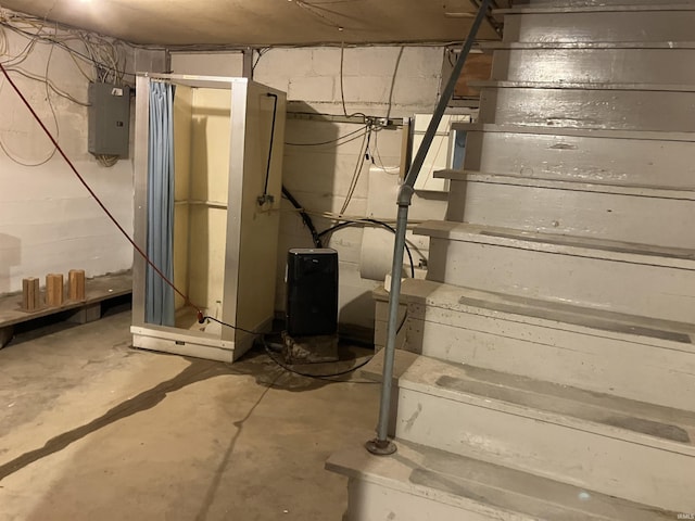20 N Meridian St, Redkey, IN 47373 - unfinished below grade area with electric panel and stairs