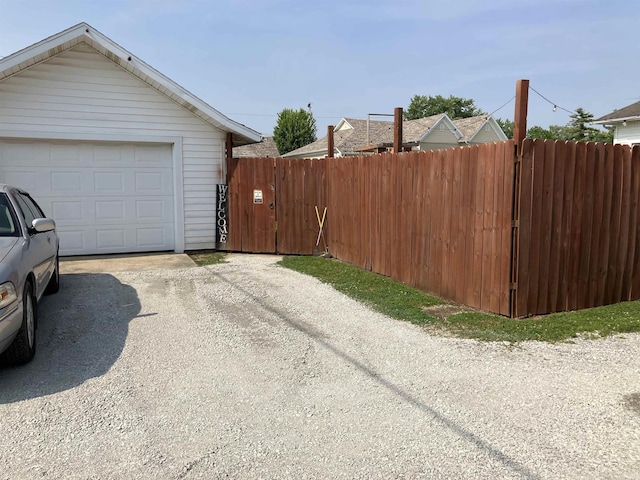 20 N Meridian St, Redkey, IN 47373 - garage with driveway and a gate