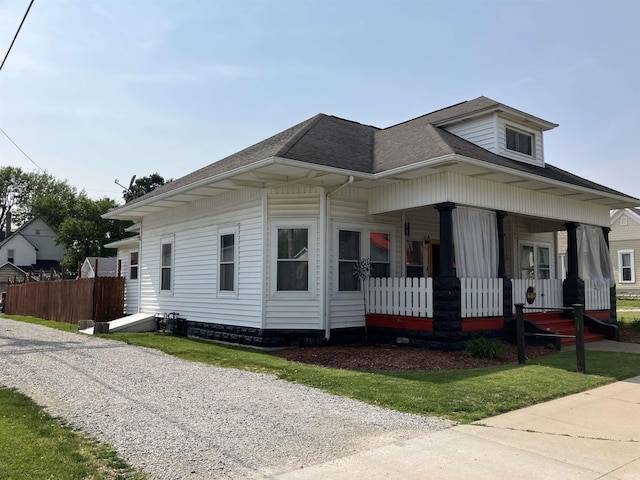20 N Meridian St, Redkey, IN 47373 - view of front of property with roof with shingles and covered porch