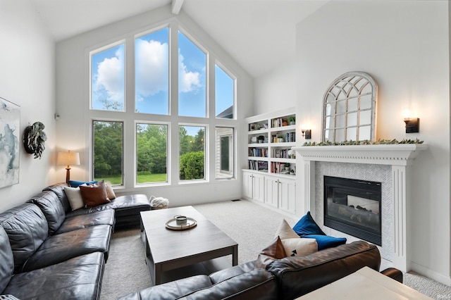 12733 Covington Manor Farms Rd, Fort Wayne, IN 46814 - carpeted living room with high vaulted ceiling, plenty of natural light, a tiled fireplace, and built in features