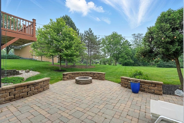 12733 Covington Manor Farms Rd, Fort Wayne, IN 46814 - view of patio / terrace featuring an outdoor fire pit and a wooden deck