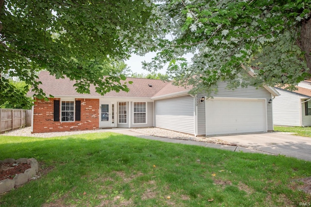 3030 Jamestown Cir, Lafayette, IN 47909 - view of front facade with a garage, concrete driveway, brick siding, and roof with shingles