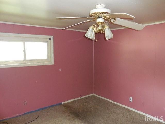 408 E Water St, Centerville, IN 47330 - carpeted empty room featuring a ceiling fan and baseboards