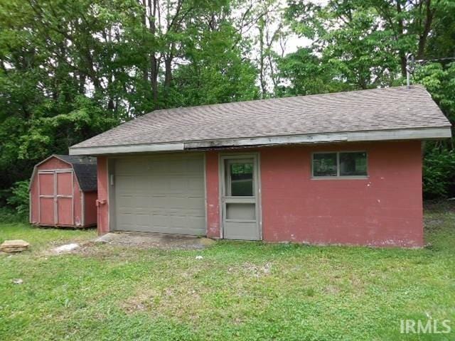 408 E Water St, Centerville, IN 47330 - garage featuring a storage unit