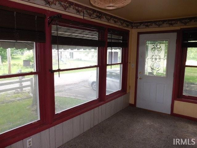 408 E Water St, Centerville, IN 47330 - unfurnished sunroom featuring carpet