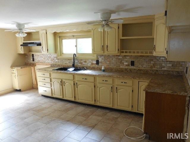 408 E Water St, Centerville, IN 47330 - kitchen featuring a ceiling fan, backsplash, open shelves, and under cabinet range hood