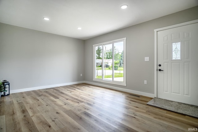 1004 Shenandoah Dr, Lafayette, IN 47905 - entryway with light wood finished floors and recessed lighting