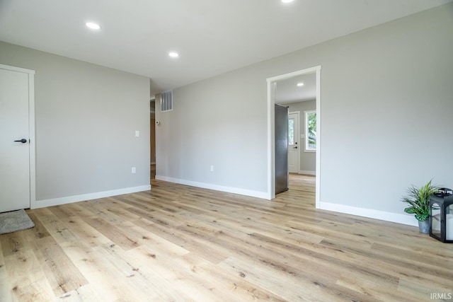 1004 Shenandoah Dr, Lafayette, IN 47905 - spare room with recessed lighting and light wood-style floors