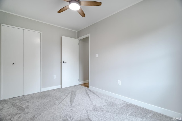 1004 Shenandoah Dr, Lafayette, IN 47905 - unfurnished bedroom with carpet flooring, a closet, ceiling fan, and ornamental molding