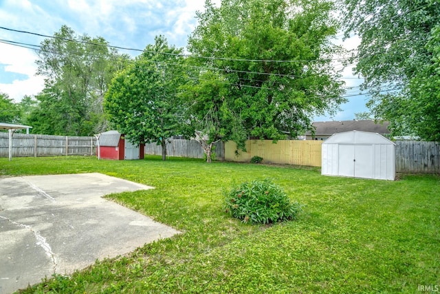 1004 Shenandoah Dr, Lafayette, IN 47905 - fenced backyard with a shed and a patio area