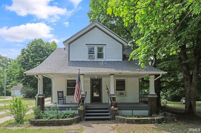 19252 Cleveland Rd, South Bend, IN 46637 - view of front of house featuring a porch and a shingled roof