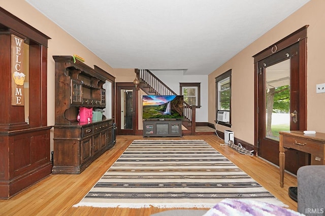 19252 Cleveland Rd, South Bend, IN 46637 - living area featuring light wood-type flooring and stairs