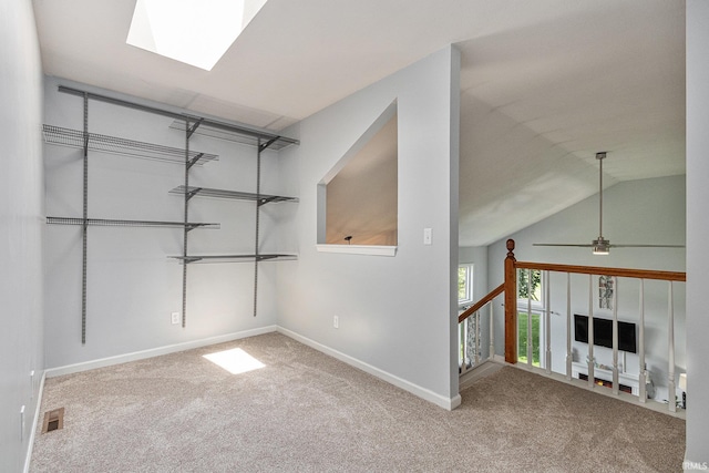 51790 Sulkey Ct, Granger, IN 46530 - unfurnished room featuring carpet flooring, ceiling fan, and vaulted ceiling