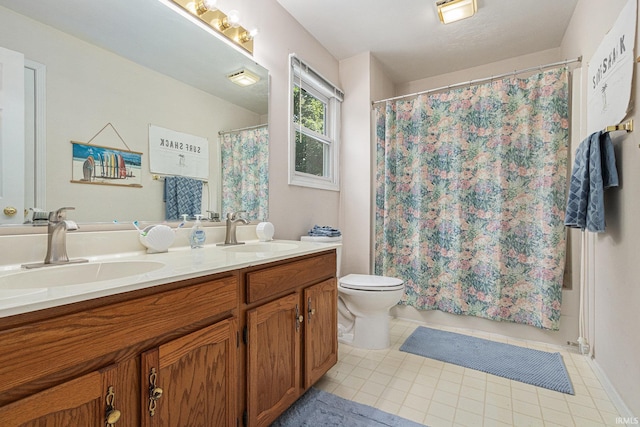 51790 Sulkey Ct, Granger, IN 46530 - bathroom with double vanity and tile patterned floors