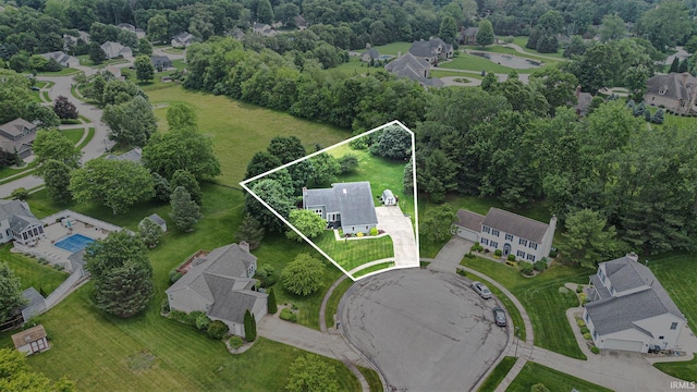 51790 Sulkey Ct, Granger, IN 46530 - aerial perspective of suburban area featuring property boundaries highlighted and a nearby body of water