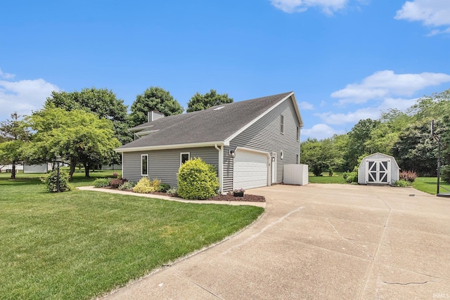 51790 Sulkey Ct, Granger, IN 46530 - view of side of property featuring a storage shed, a yard, driveway, a chimney, and roof with shingles