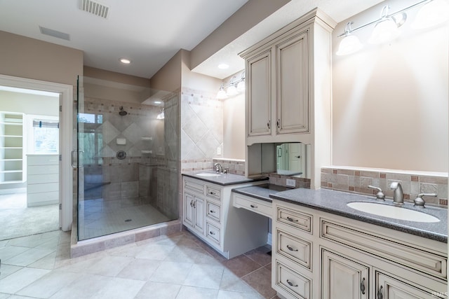 3328 Tarrant Springs Trl, Fort Wayne, IN 46804 - full bath featuring vanity, a shower stall, decorative backsplash, and tile patterned floors
