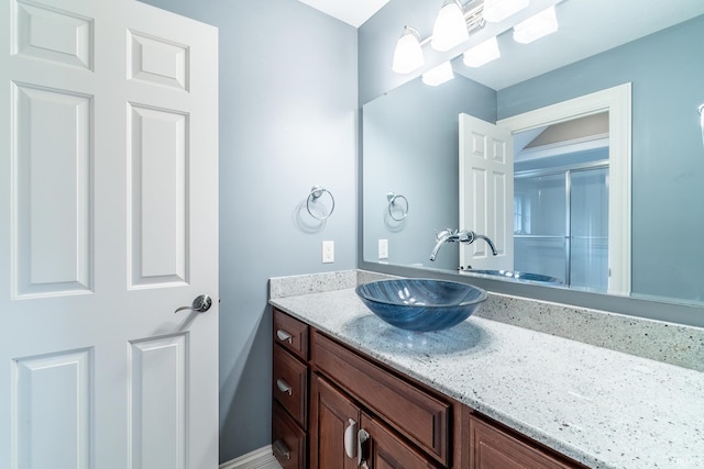 3328 Tarrant Springs Trl, Fort Wayne, IN 46804 - bathroom featuring vanity and a shower with shower door