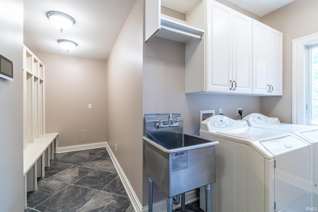 3328 Tarrant Springs Trl, Fort Wayne, IN 46804 - laundry area featuring cabinet space and separate washer and dryer