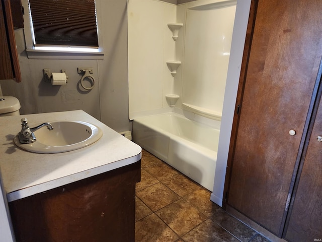 317 E Main St, Berne, IN 46711 - full bath with tile patterned floors, vanity, and shower / tub combination