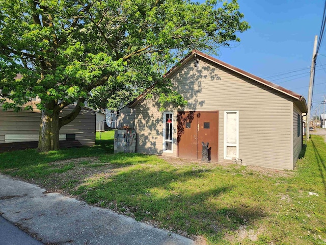 317 E Main St, Berne, IN 46711 - exterior space with a front yard